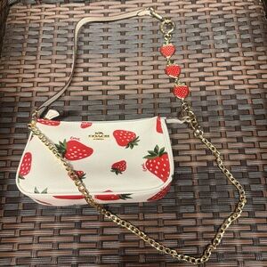 Coach Nolita 19 with wild strawberry print ch533